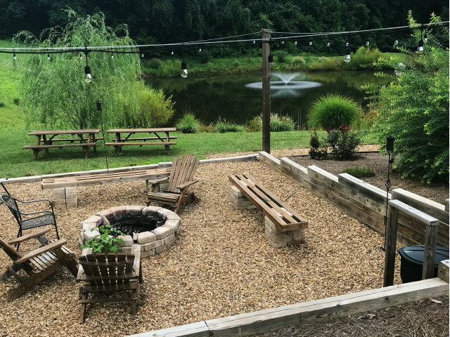 Image of Fire Pit and Stocked Pond for The Villages at Wake Forest
