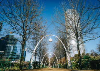 Sitting over Woodall Rogers Freeway, Klyde Warren Park is an engineering marvel and one of a kind attraction! Here you can take a stroll through the 5 acres of greenspace, tune into a movie in the park, or grab a bit at Food Truck Lane. at Klyde Warren Park