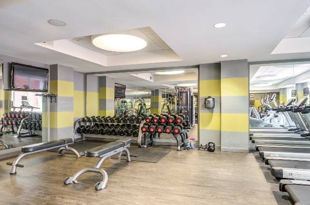 Fully equipped fitness studio with Fitness on Demand