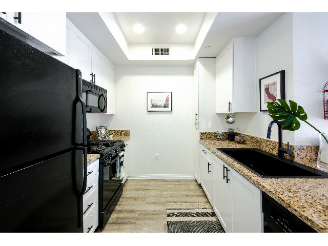 Fully Equipped Kitchen with Granite Counter Tops