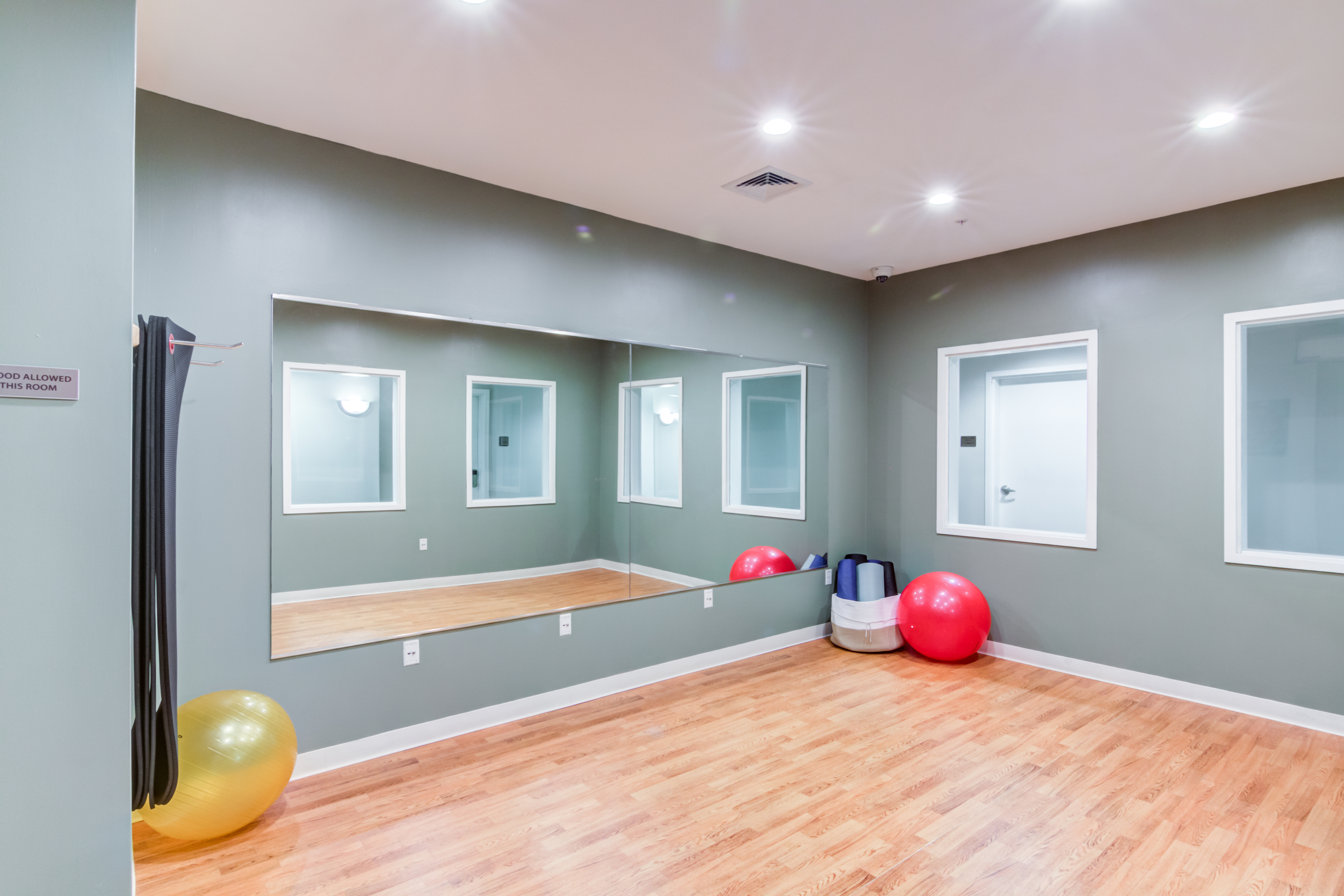 spacious mirrored yoga studio