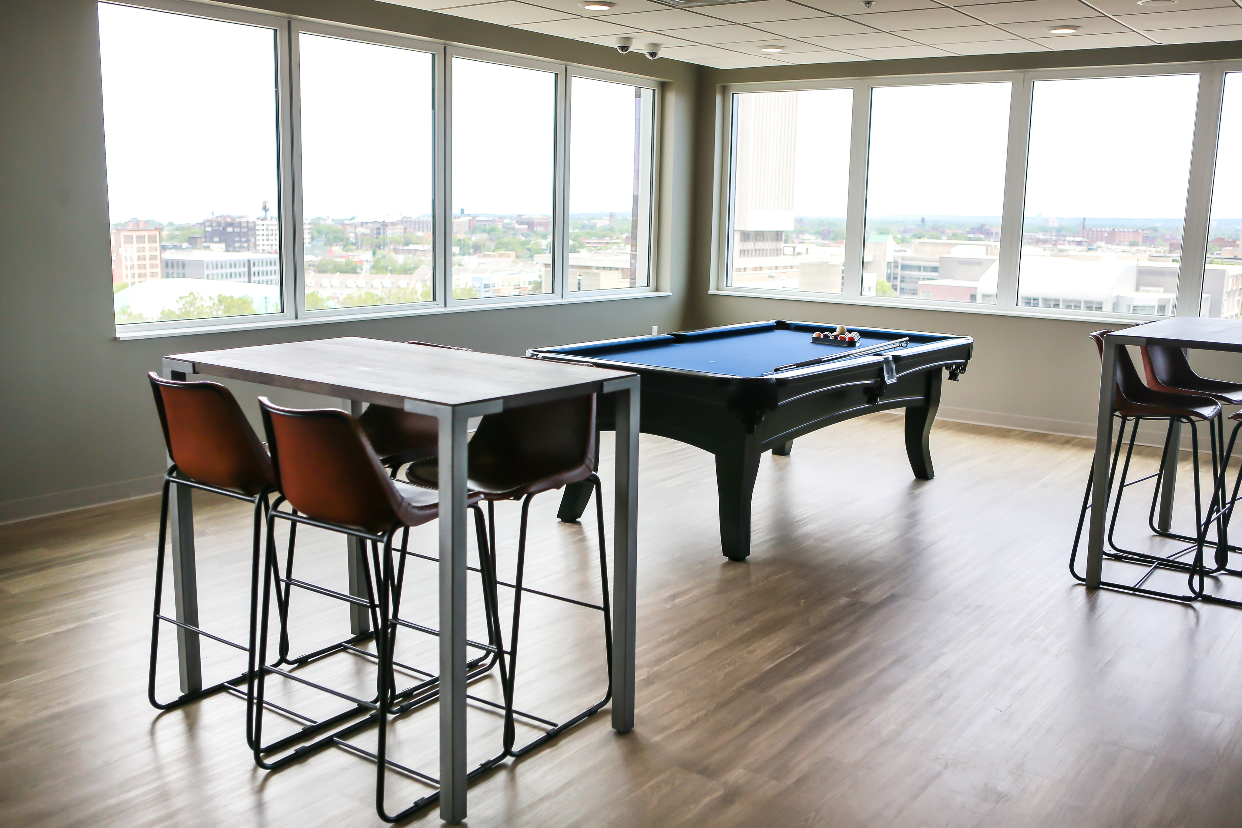 Residents Relaxing in Club Room | Cleveland OH Apartment For Rent | The Edge on Euclid