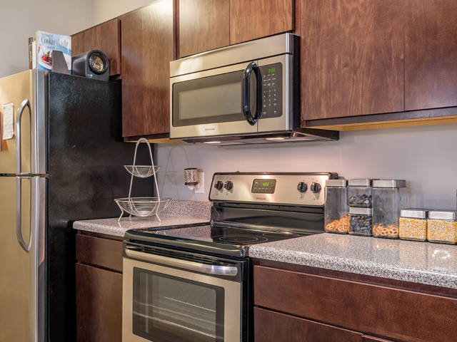 Open kitchen with ample storage space.