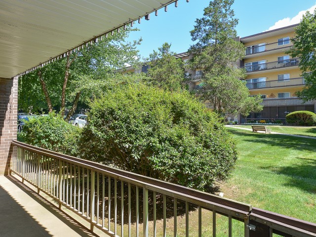 Image of 12' Oversized sliding glass doors opens to private, oversized patios/balconies for Main Line Berwyn Apartments