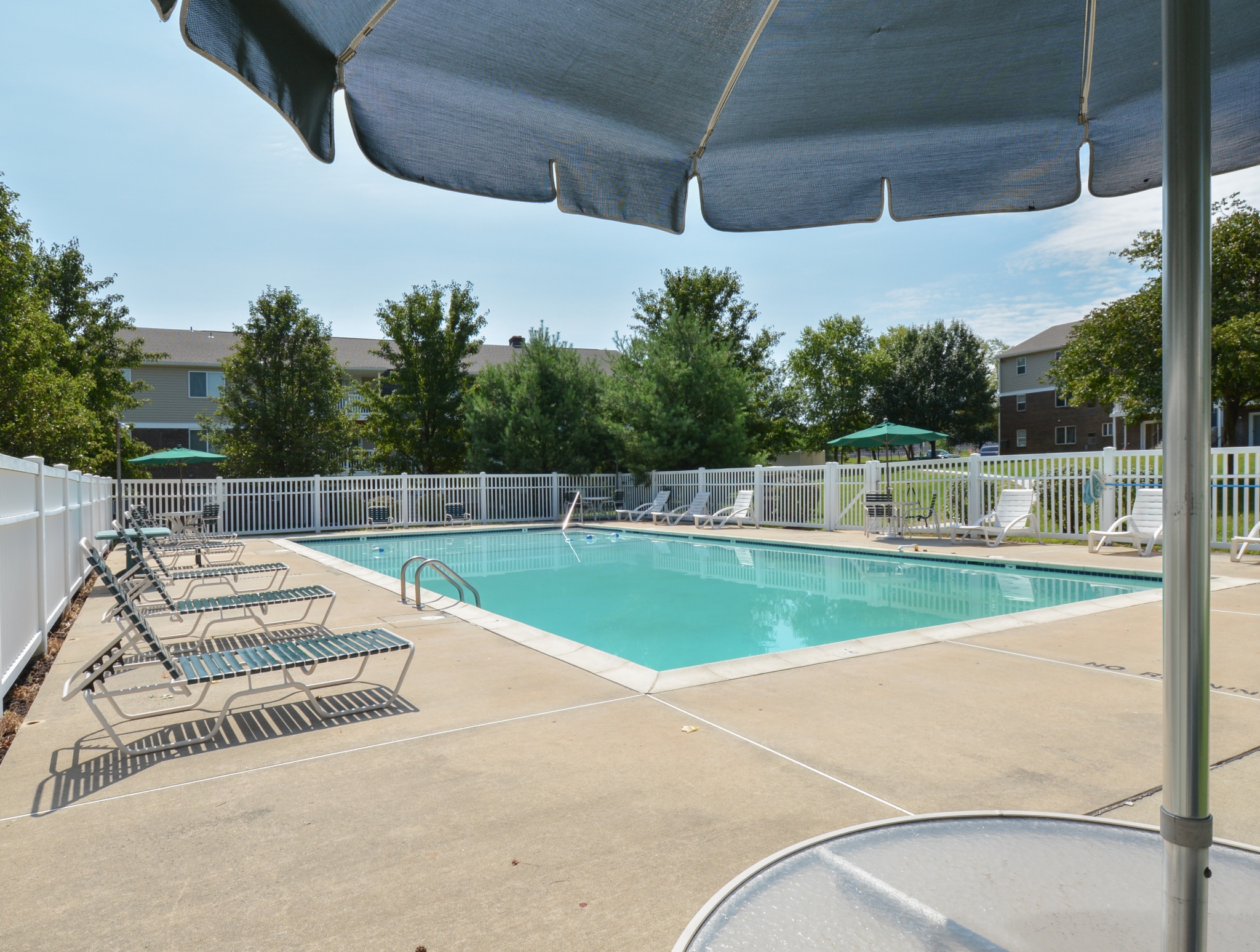 Glen Eagle Village Swimming Pool with Umbrella Shade | Newark Apartments Near DE