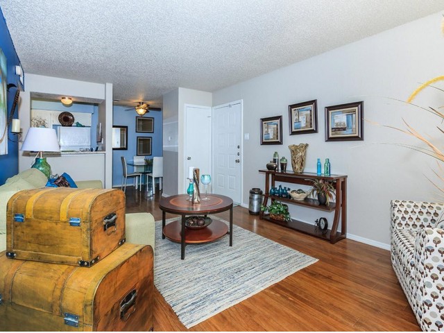 Spacious Living rooms with Pass-through Bars and 2-inch Blinds*