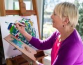 Senior lady painting l Monterey Pointe Apartments