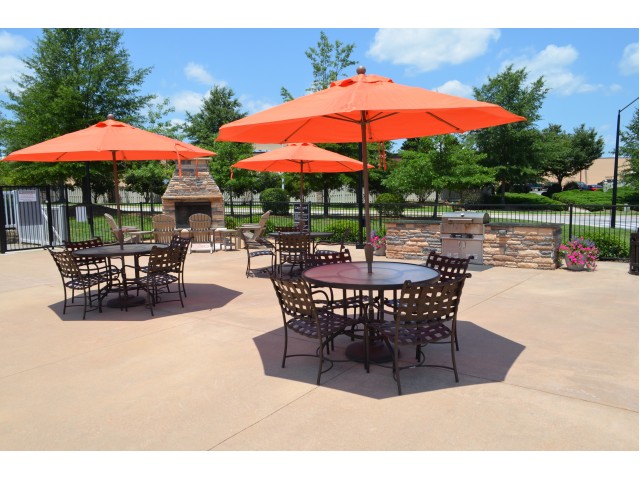 Residents Lounging by the Pool | Knightdale NC Apartments For Rent | Greystone at Widewaters