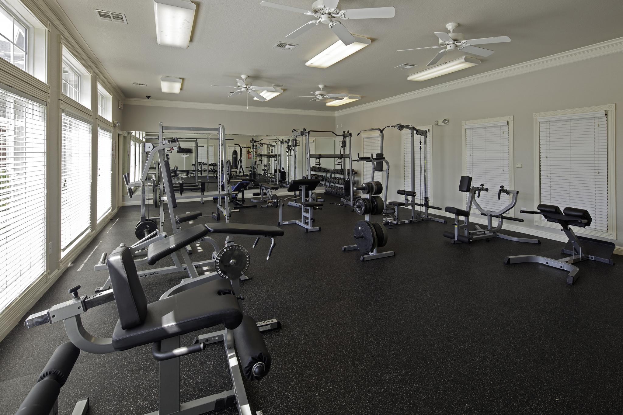 Weight benches and weight machines in the Cayce Cove fitness center
