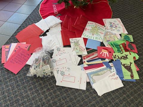A big pile of holiday cards donated for senior citizens living in care facilities