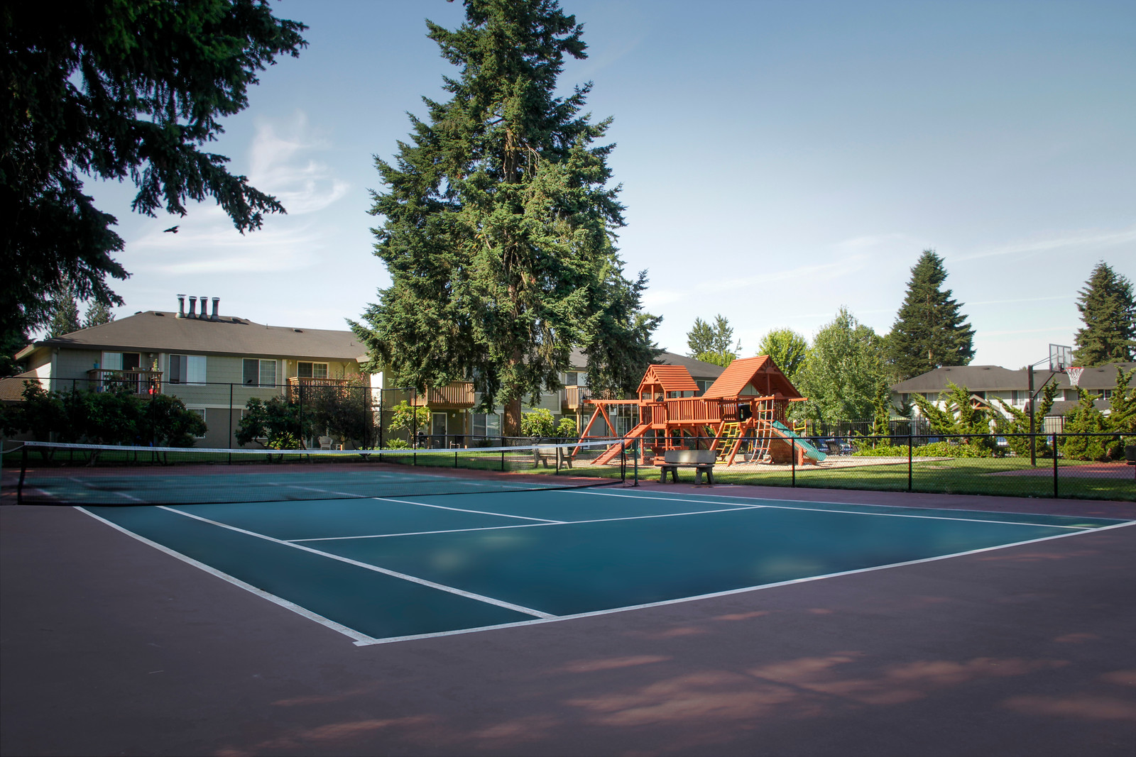 Community Tennis Court and Playground | Puyallup WA Apartments For Rent | Willow Hill