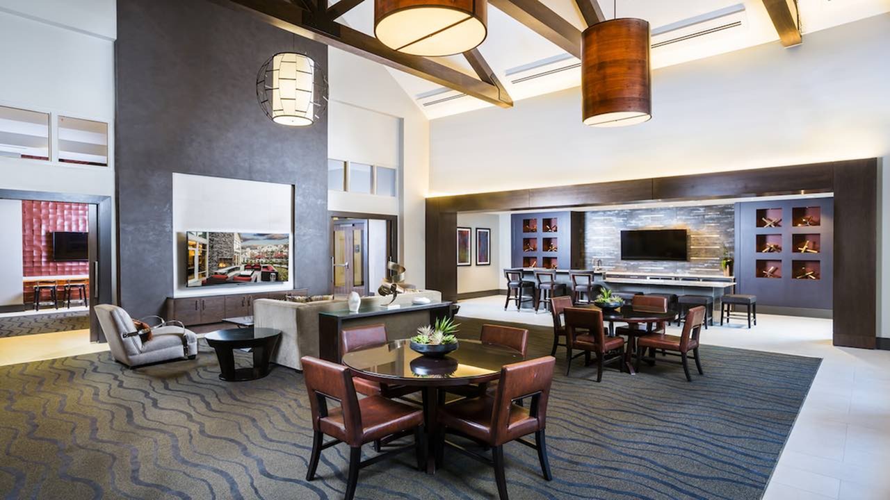 Community clubhouse with flatscreen TVs and bar. Community clubhouse with flatscreen TVs and bar.